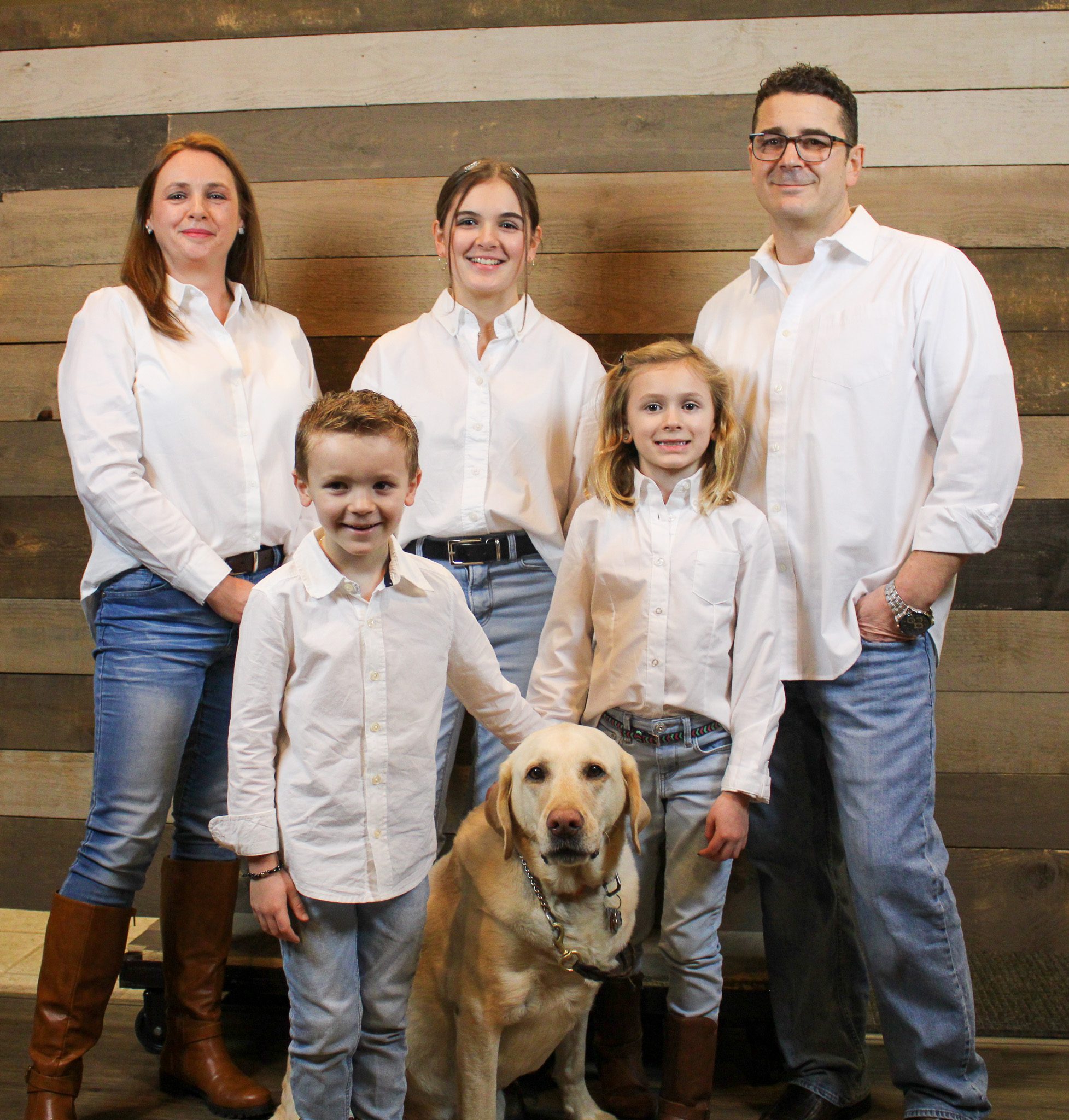 Dillon and Joanie Rands, owners of Heritage Home Painting, with their family in Cranberry Township, PA