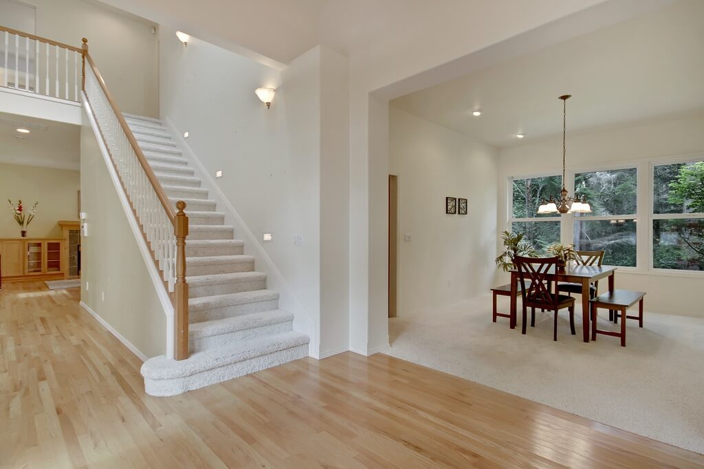 freshly painted white interior staircase and walls in a home in Cranberry Township, PA