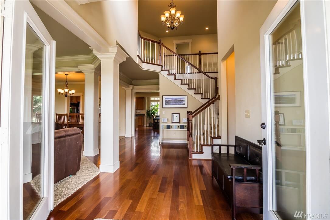 freshly painted home foyer with staircase and hardwood floors in Cranberry Township, PA