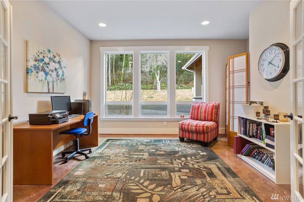freshly painted home office with neutral walls, wooden desk, and large windows in Cranberry Township, PA